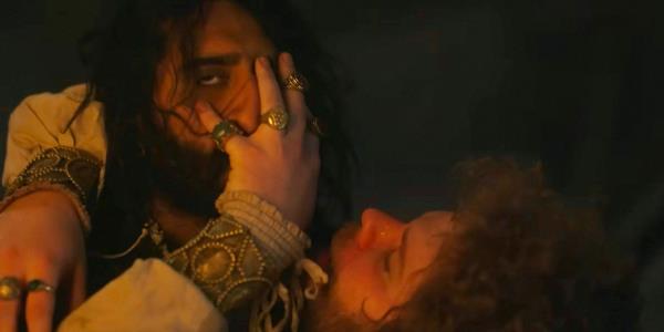 Tindaro (Douggie McMeekin) drunk and touching Dio<em></em>neo (Amar Chadha-Patel)'s face in The Decameron season 1