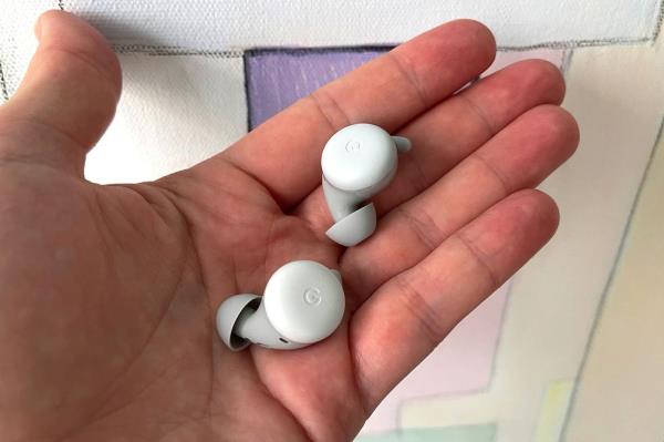 google pixel buds in hand